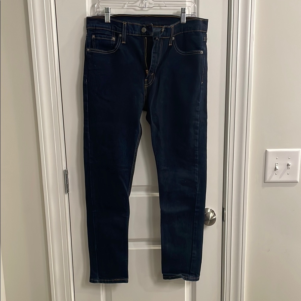 Men's Dark Blue Jeans
Size: 33x30
Style: slim